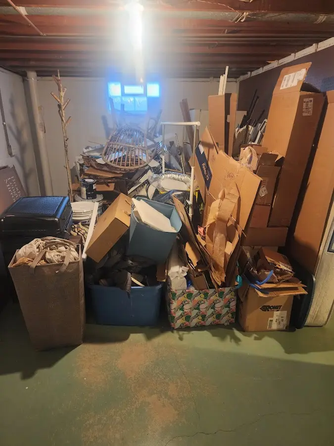 Roll-off dumpster container at job site for Construction Dumpster Rental in Columbia Falls